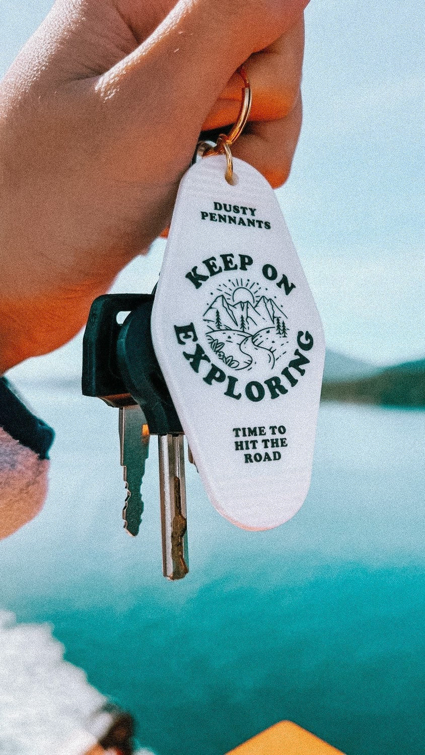 Keep on Exploring Motel Keychain